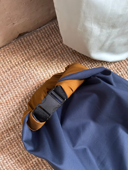 Close up of a blue surfboard bag. 