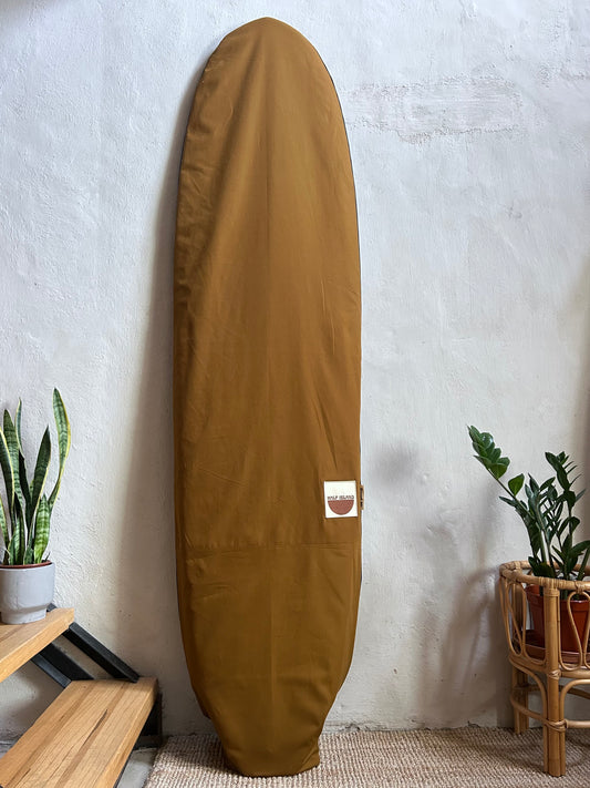 Brown canvas surfboard bag